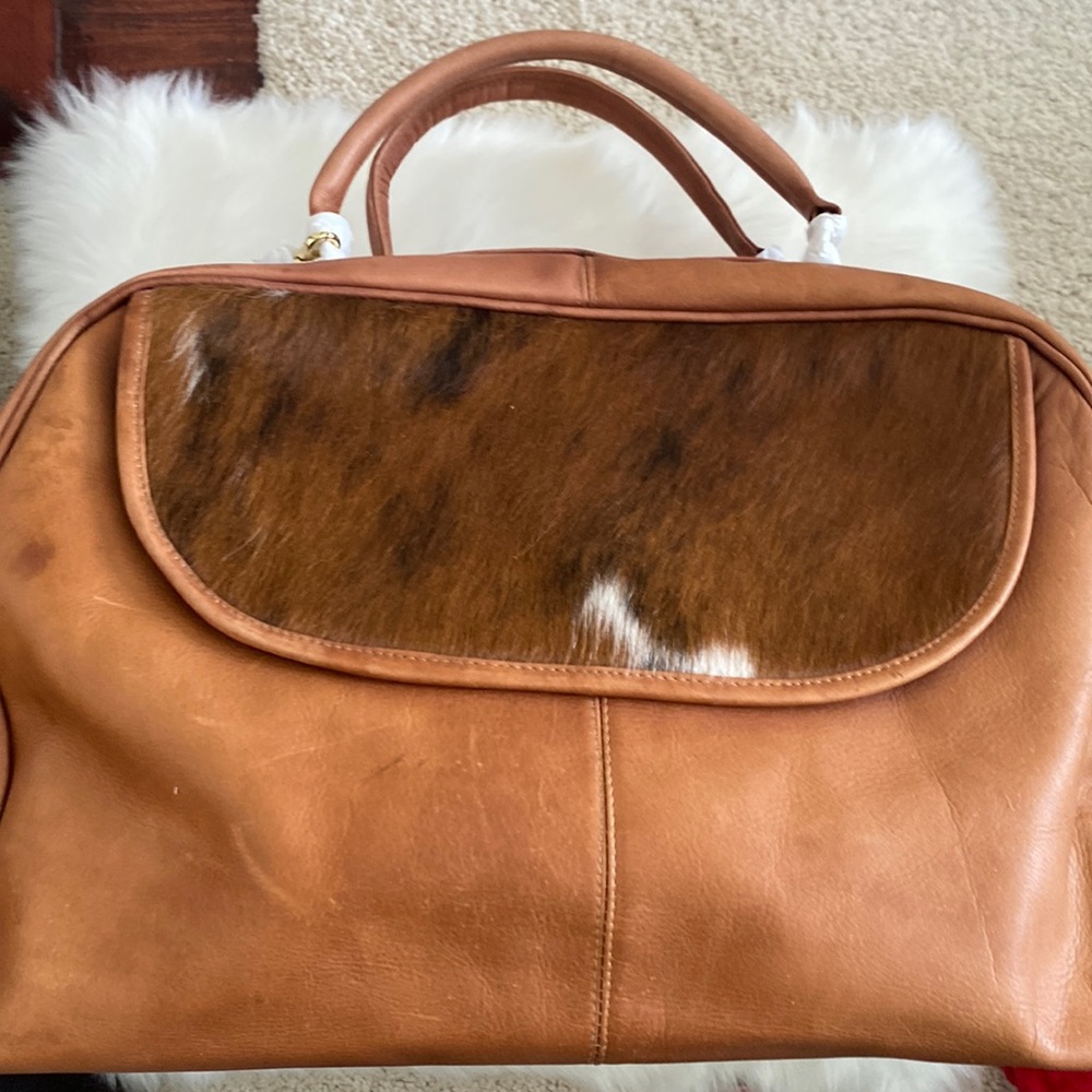 Leather and cow hide Travel bag